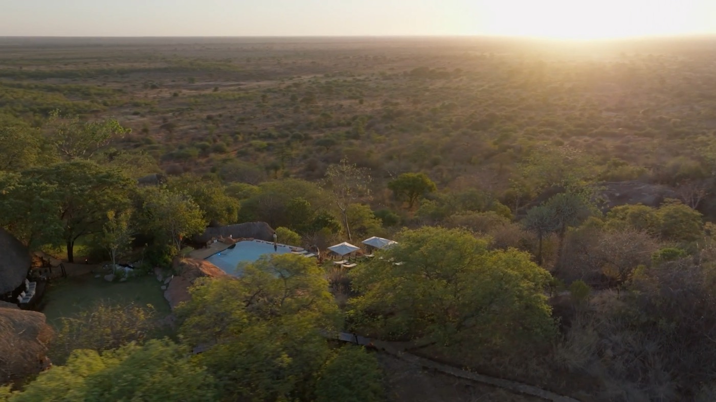 Aerial view of the Elsa's Kopje lodge and pool above the Meru plains
