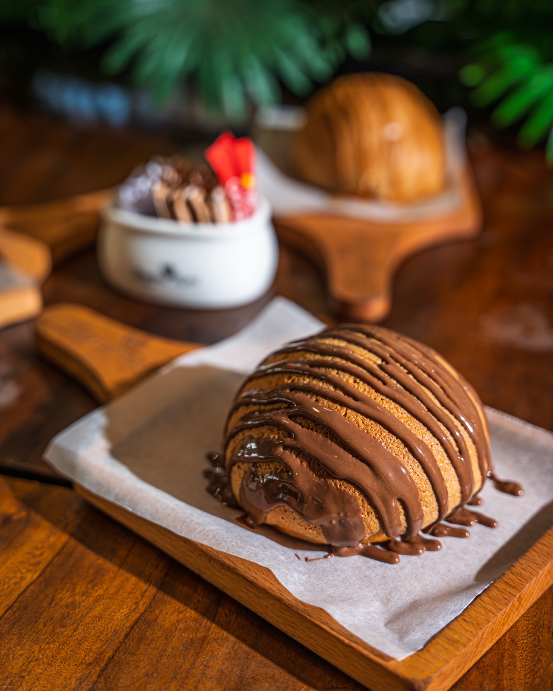 Chocolate-glazed pastry with dips