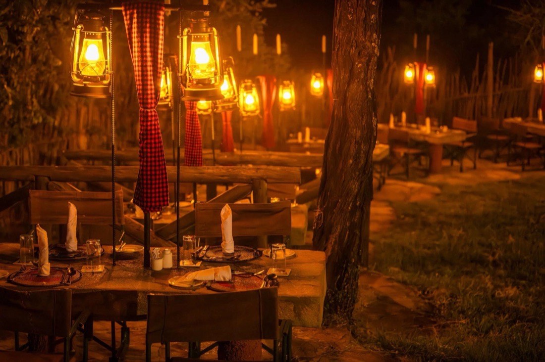 Lantern-lit dinner setup styled for an evening shoot