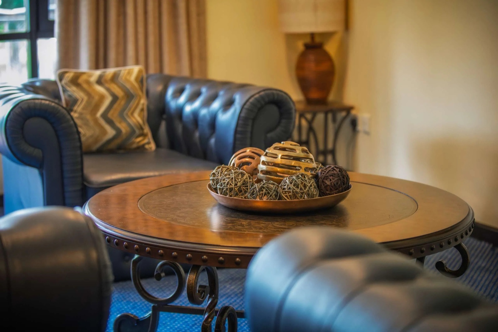 Leather lounge with a carved coffee table